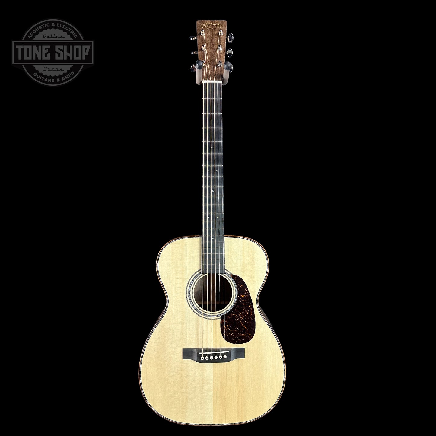 Full front of Martin Custom Shop 28 Style 00-14F Italian Alpine Spruce/Exceptionally Figured Black Walnut.