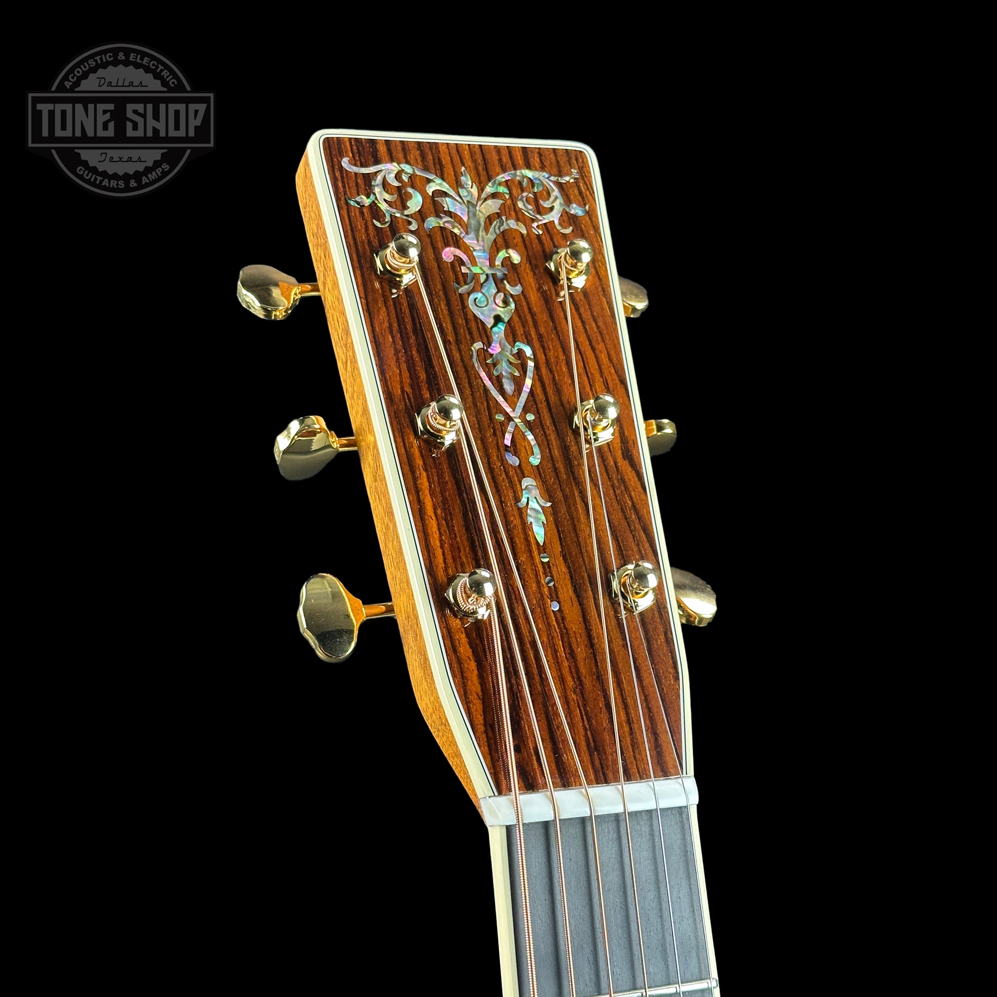 Front of headstock of Martin Custom Shop OM-41 Ambertone Torch Motif Carpathian Spruce/Cocobolo.