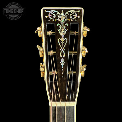 Front of headstock of Martin Custom Shop 00-42 Torch Motif Black Sitka/EIR.