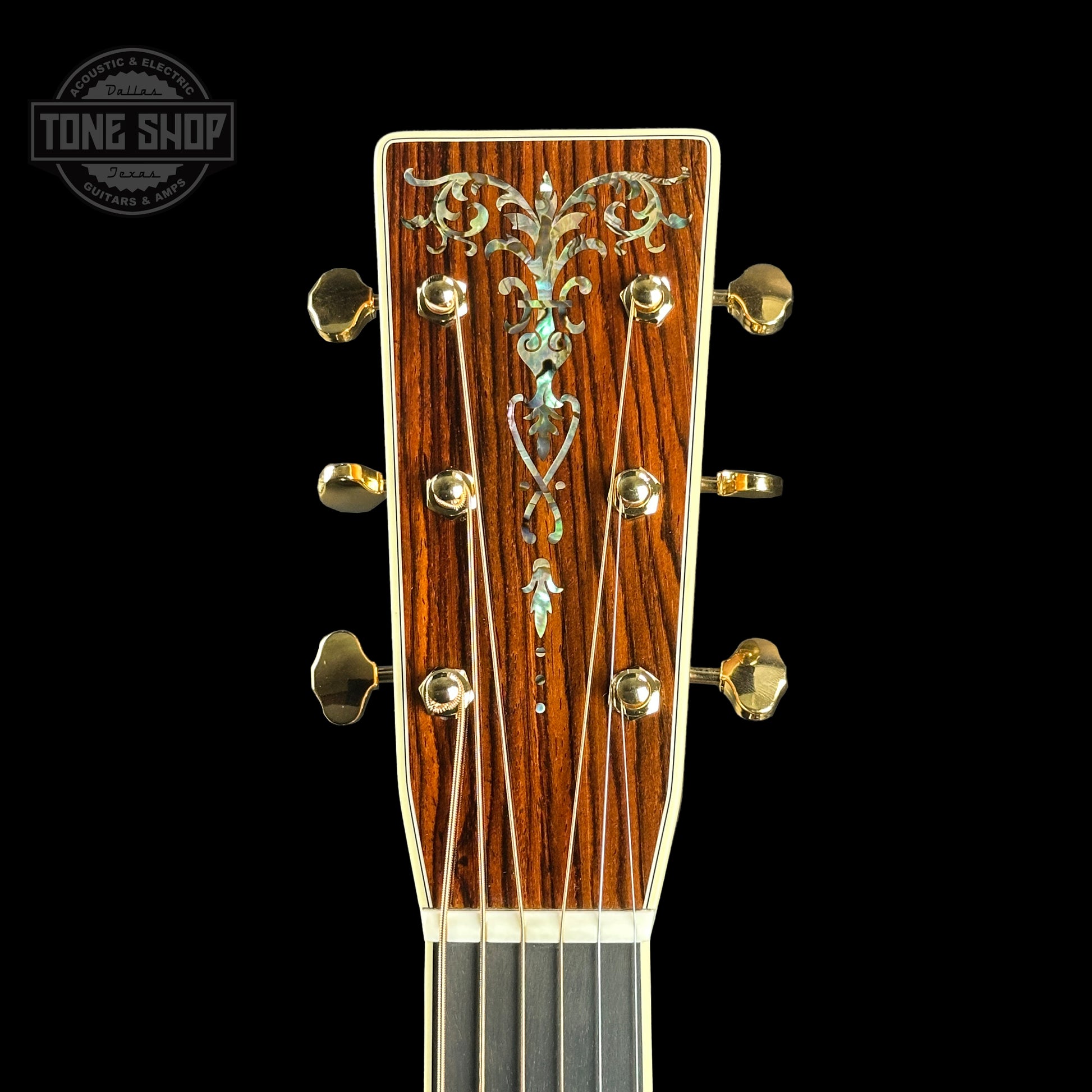 Front of headstock of Martin Custom Shop OM-41 Ambertone Torch Motif Carpathian Spruce/Cocobolo.