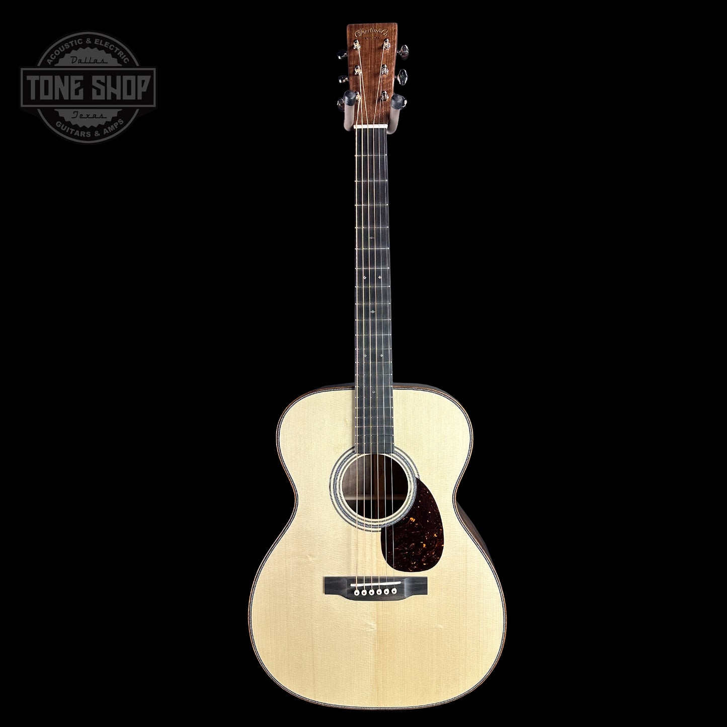 Full front of Martin Custom Shop 28 Style OM Italian Alpine Spruce/Exceptionally Figured Black Walnut.