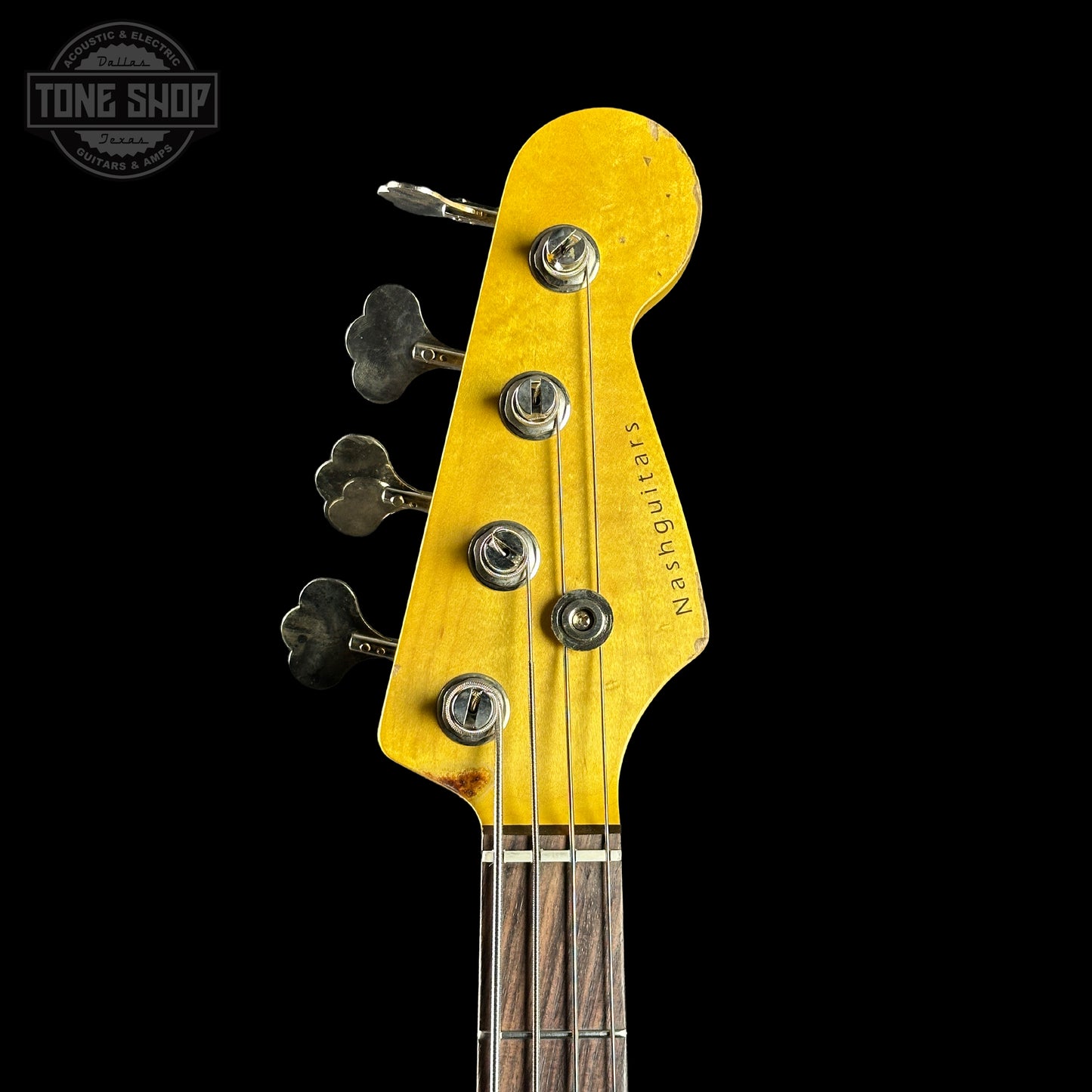 Headstock of Nash PB-63 Black Heavy Aged Tort Guard.