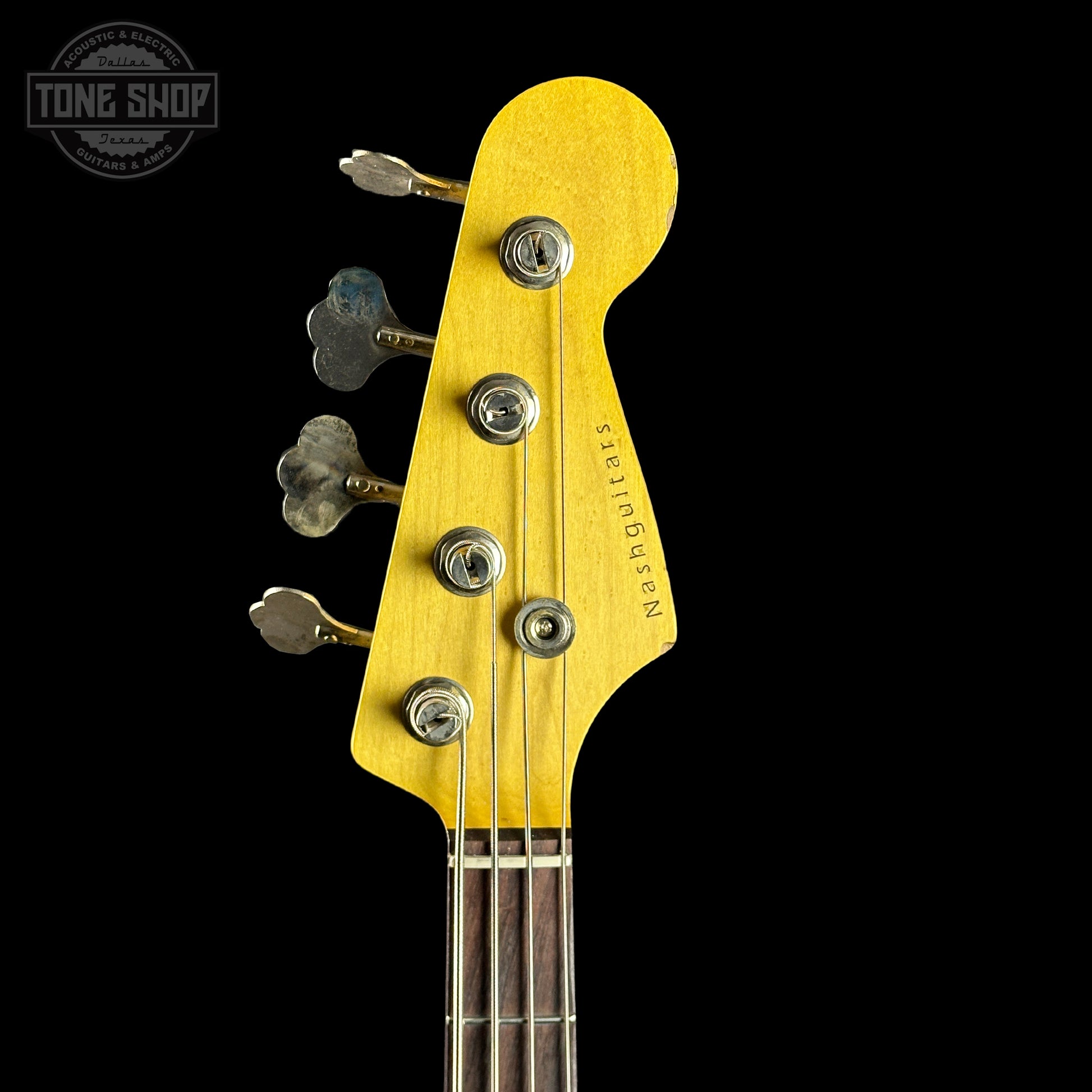 Headstock of Nash JB-63 Black Med Aging Alder/RW Tort Guard.