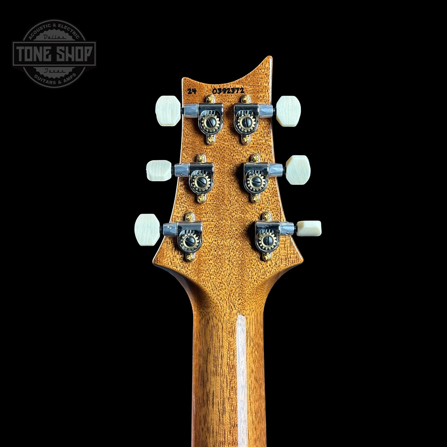 Back of headstock of PRS TSG Anniversary Wood Library Artist DGT Gold Storm Fade Brazilian Rosewood.