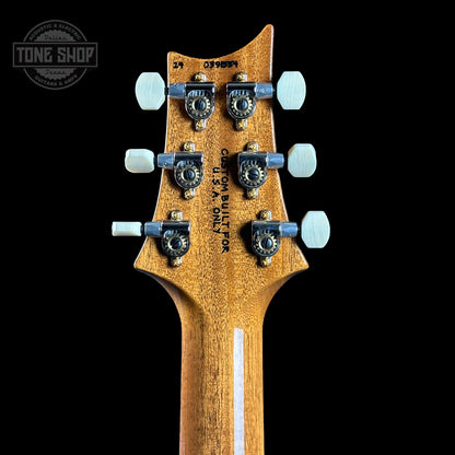 Back of headstock of PRS TSG Anniversary Wood Library Artist DGT Gold Storm Fade Brazilian Rosewood.