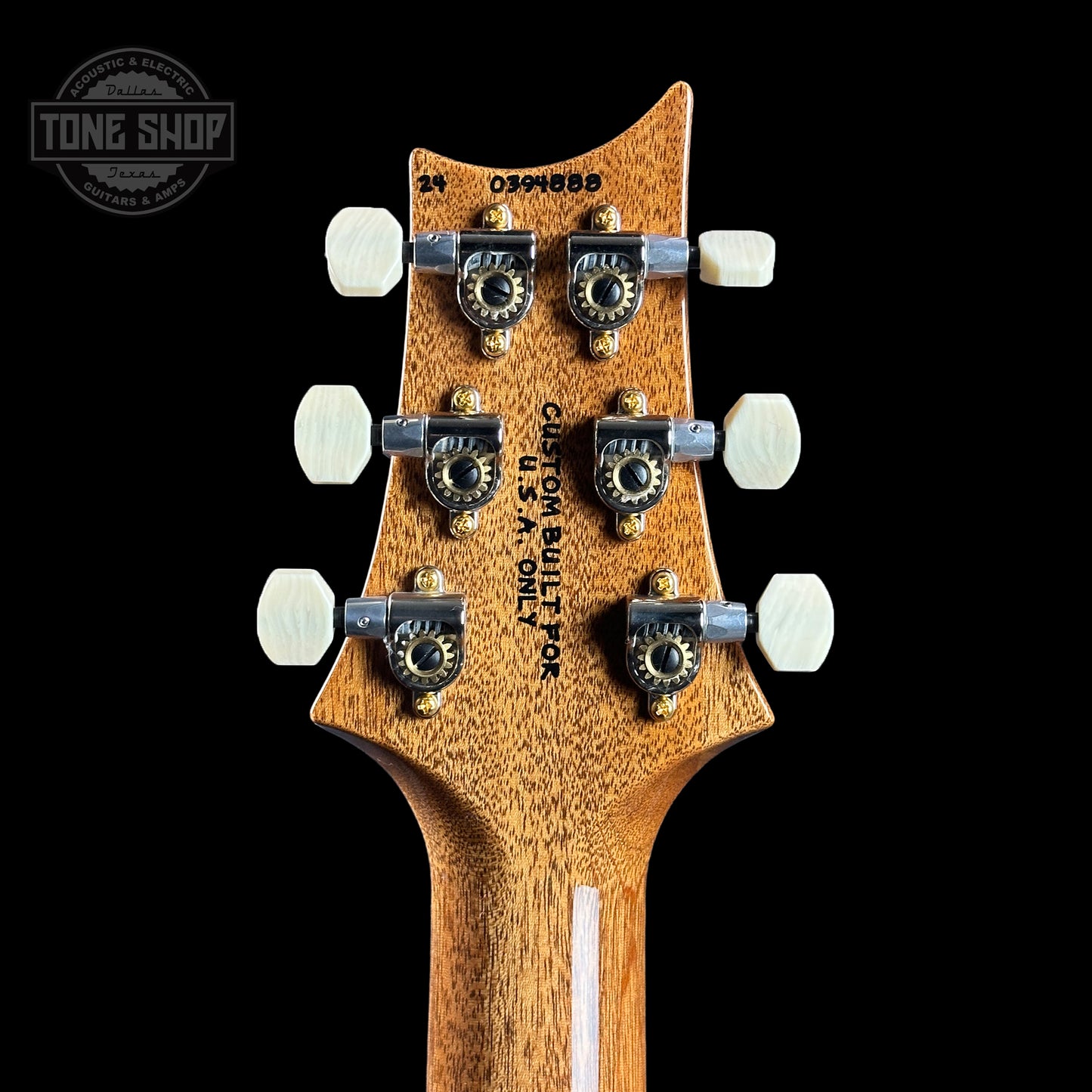 Back of headstock of PRS TSG Anniversary Wood Library Artist DGT Gold Storm Fade Brazilian Rosewood.