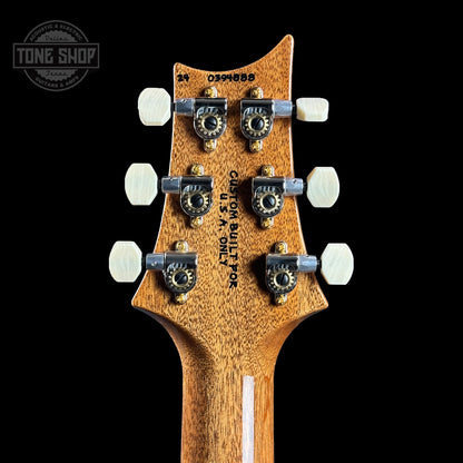 Back of headstock of PRS TSG Anniversary Wood Library Artist DGT Gold Storm Fade Brazilian Rosewood.