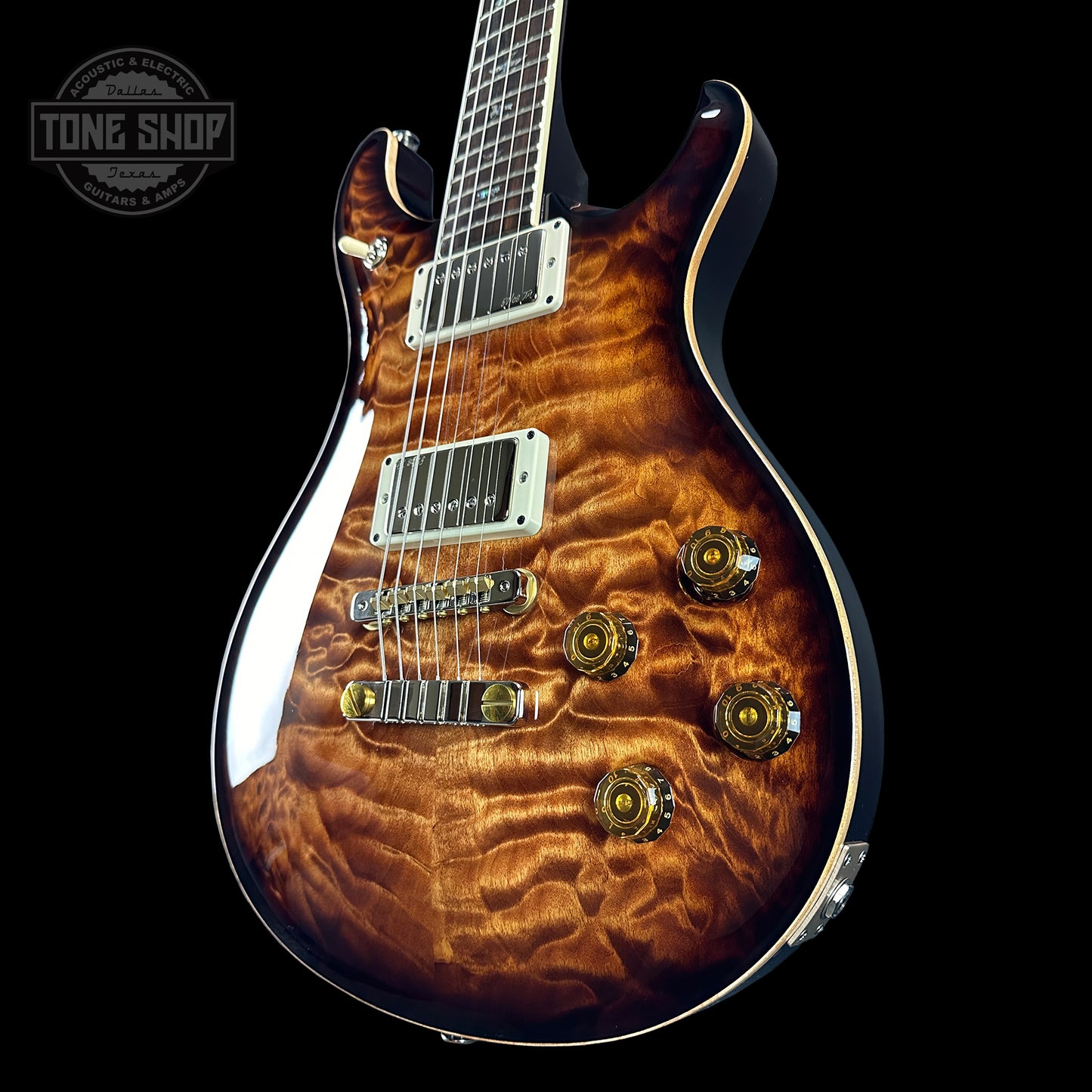 Front angle of PRS Wood Library McCarty 594 10-top Quilt Copperhead Burst.