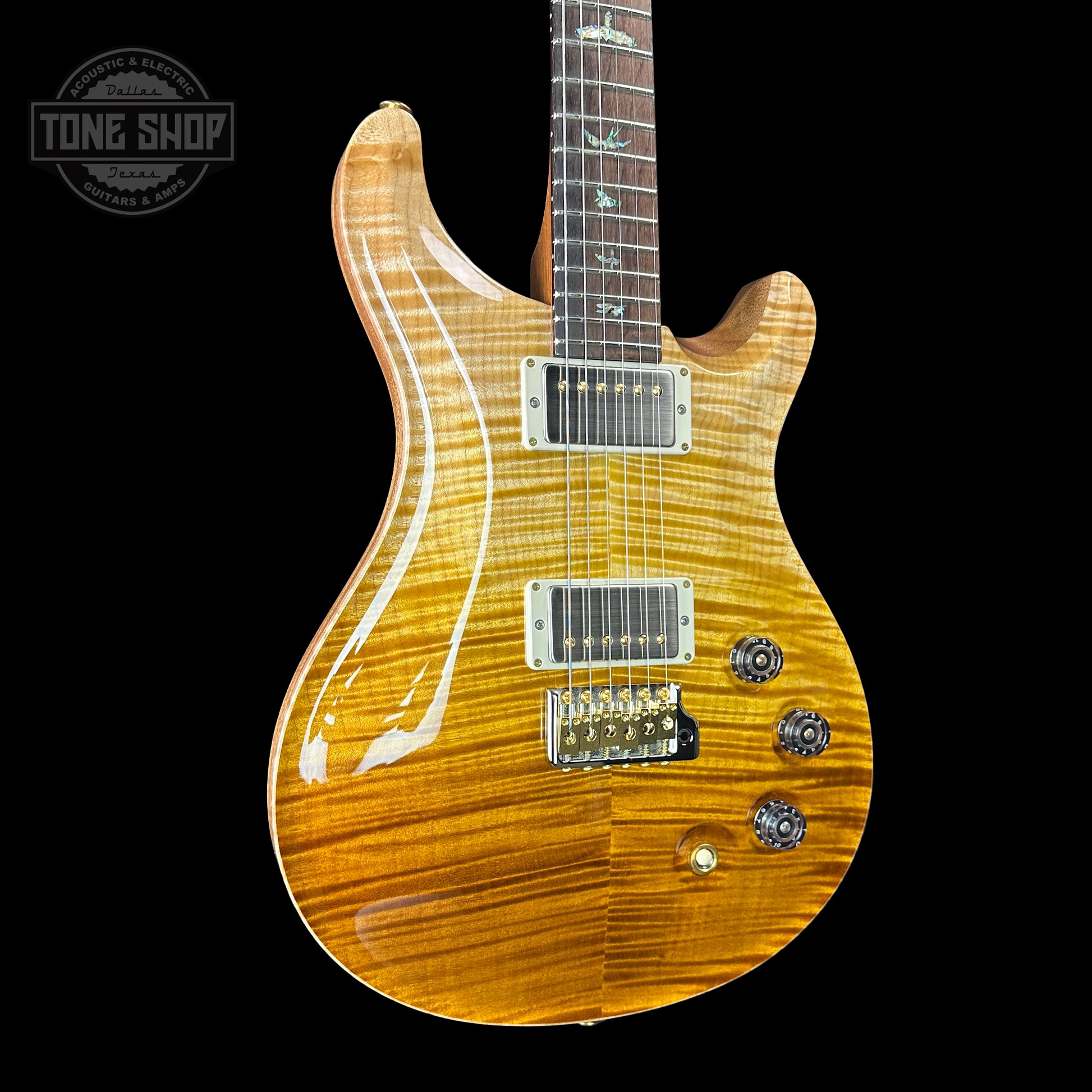 Front angle of PRS TSG Anniversary Wood Library Artist DGT Gold Storm Fade Brazilian Rosewood.