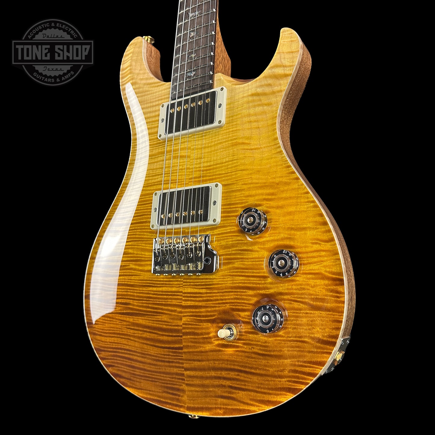 Front angle of PRS TSG Anniversary Wood Library Artist DGT Gold Storm Fade Brazilian Rosewood.