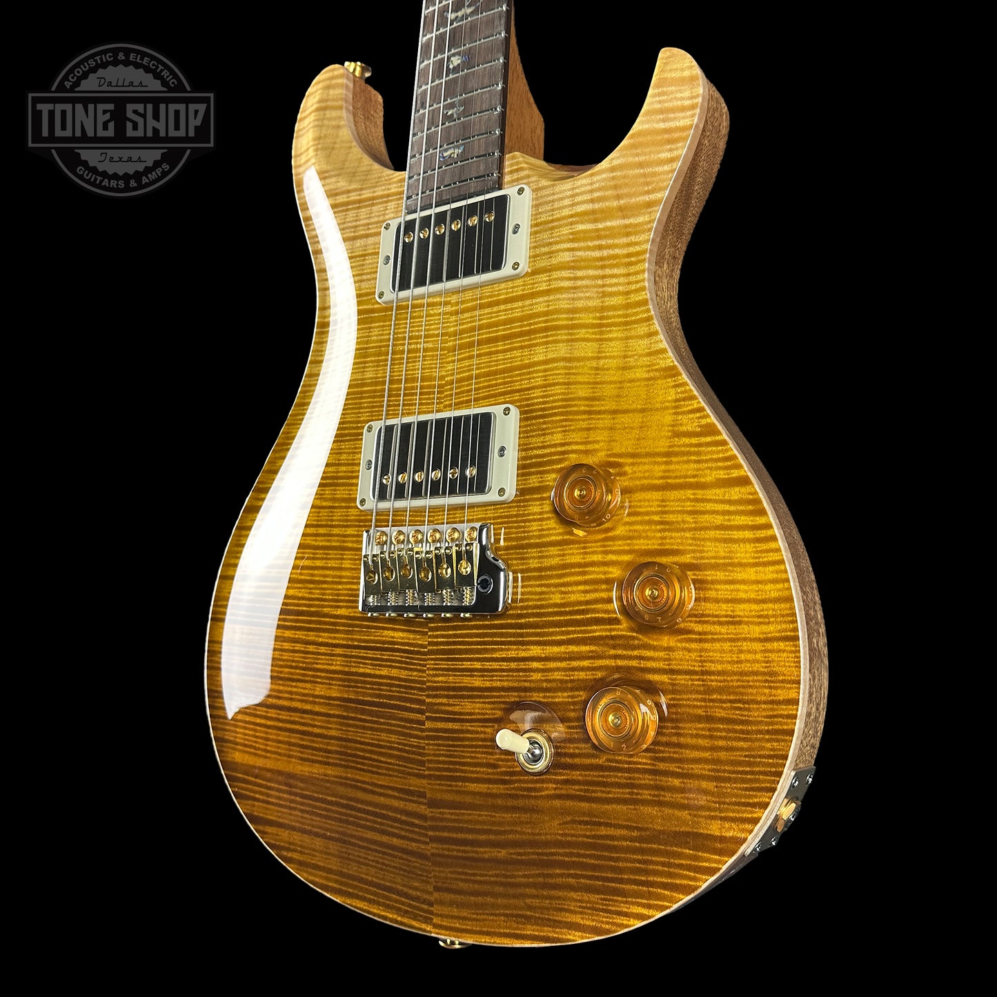 Front angle of PRS TSG Anniversary Wood Library Artist DGT Gold Storm Fade Brazilian Rosewood.