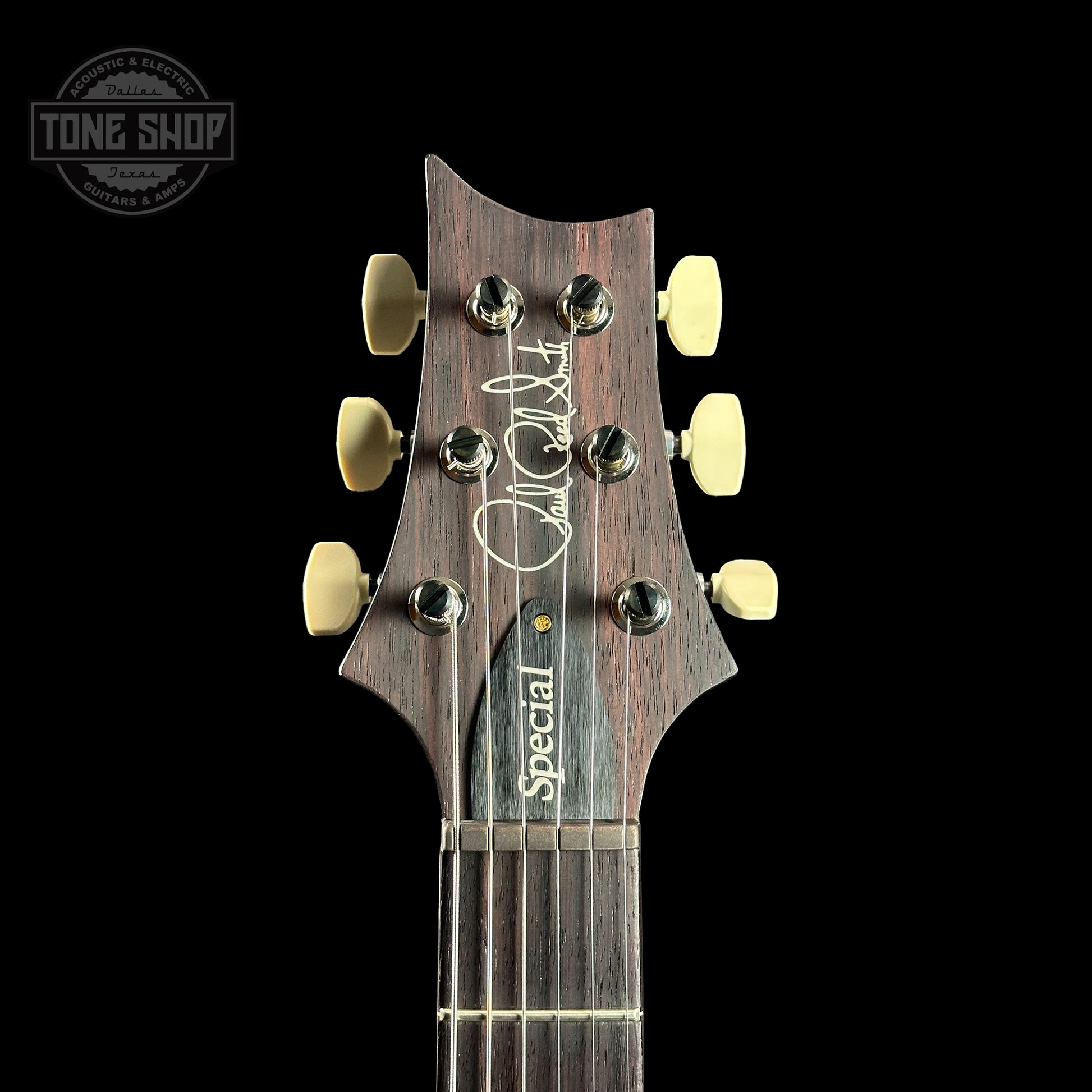 Front of headstock of PRS Special Semi-hollow Cobalt Smokeburst 10 Top Birds.