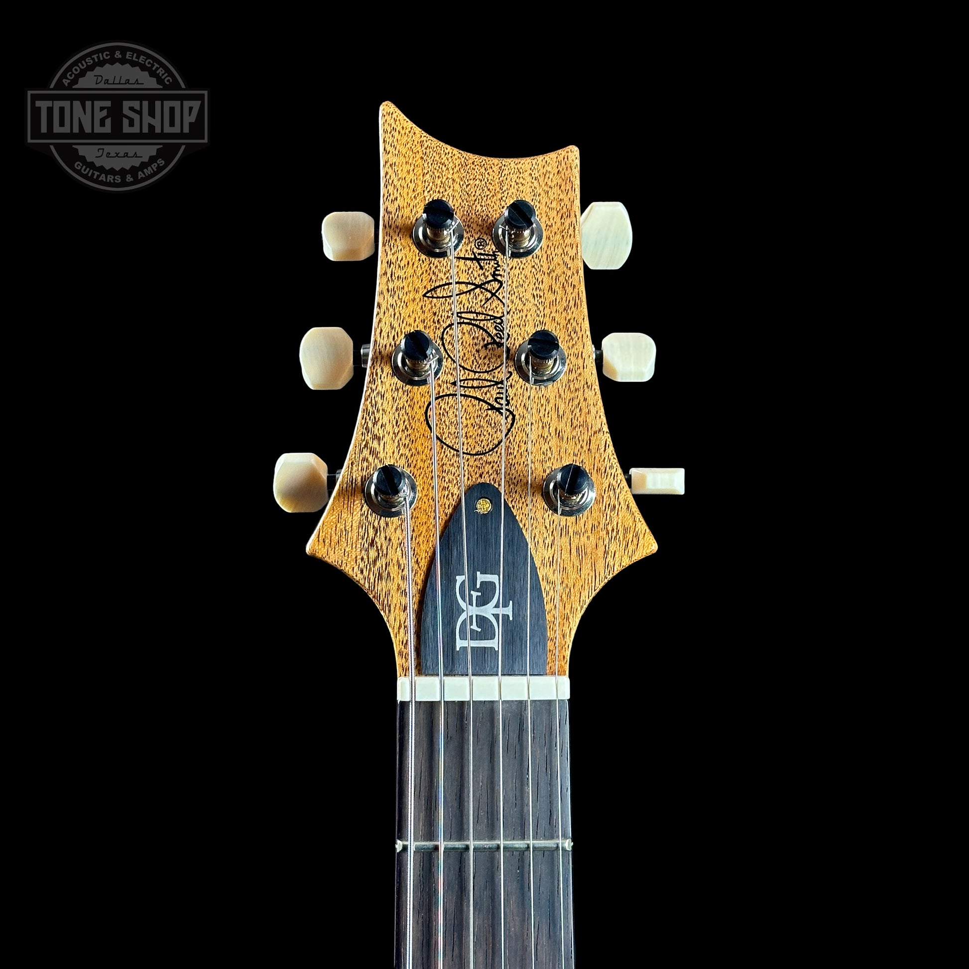 Front of headstock of PRS TSG Anniversary Wood Library Artist DGT Frostbite Brazilian Rosewood.