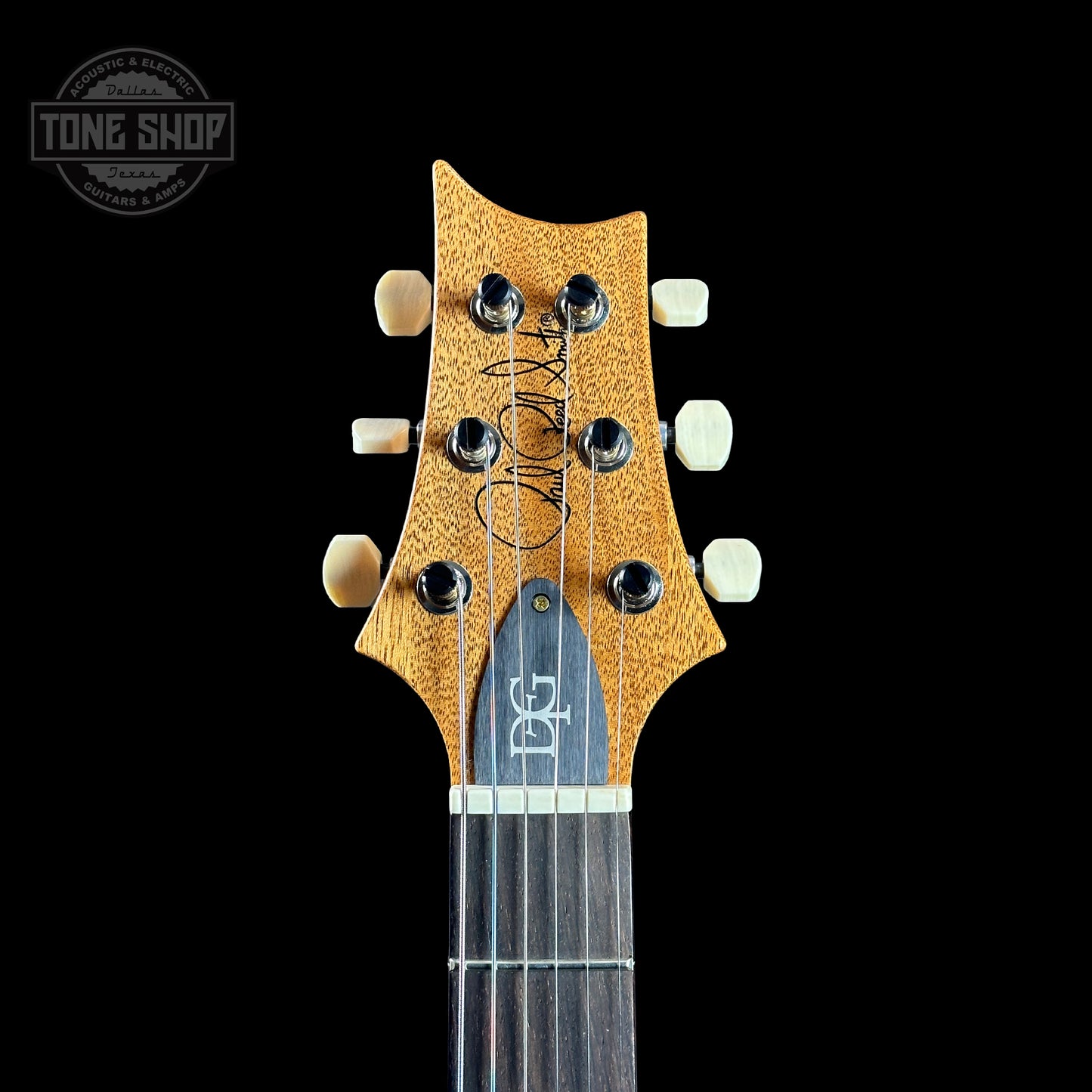 Front of headstock of PRS TSG Anniversary Wood Library Artist DGT Frostbite Brazilian Rosewood.