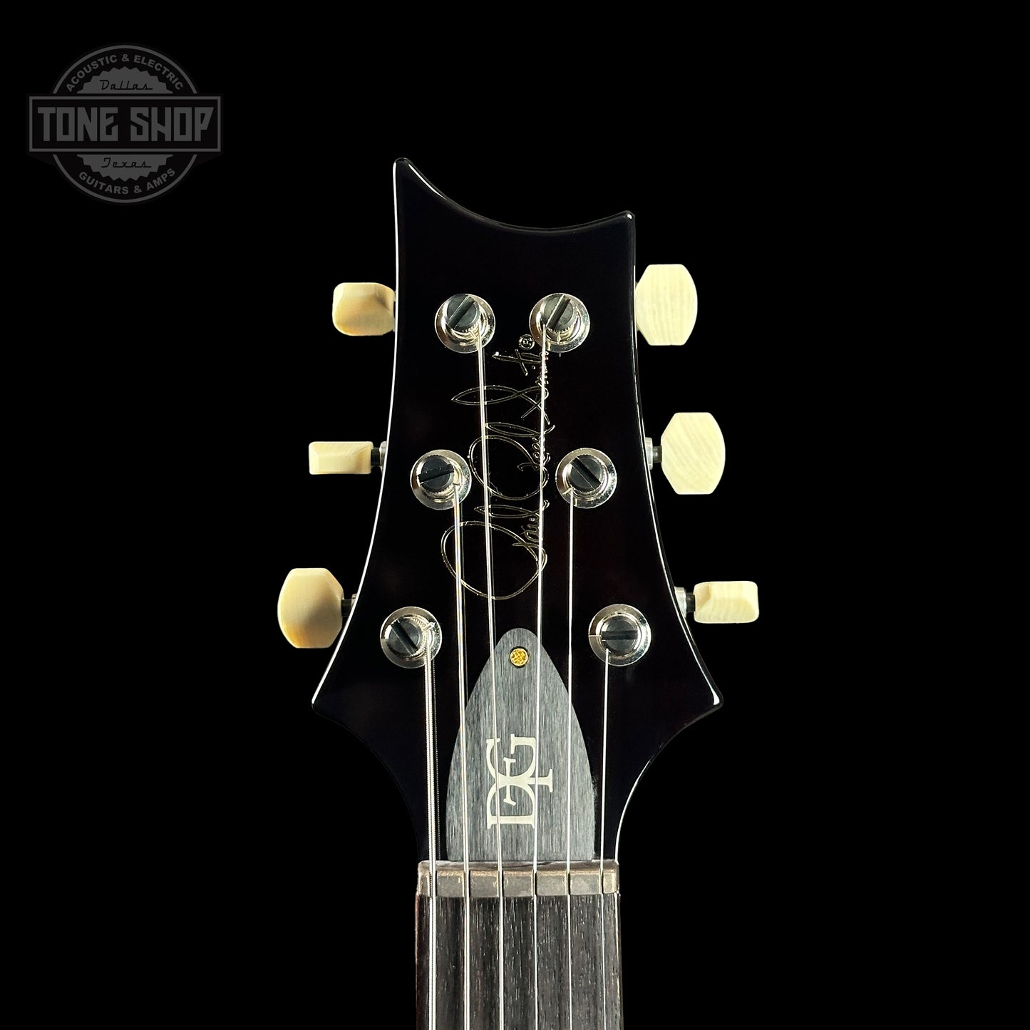 Front of headstock of PRS DGT Black Gold Wraparound Burst 10 Top Birds.