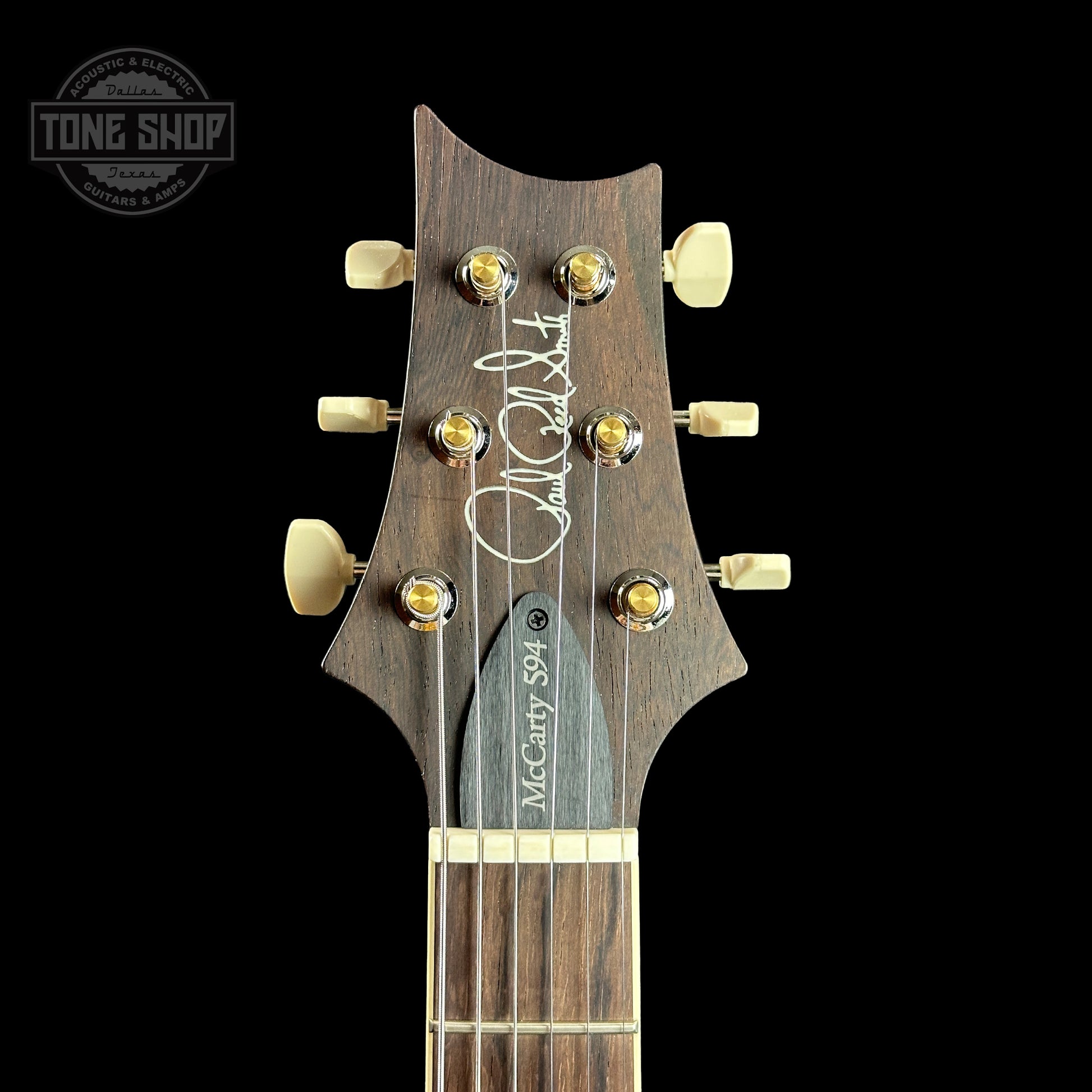 Front of headstock of PRS Wood Library McCarty 594 Honey 10-top Brazilian FB.