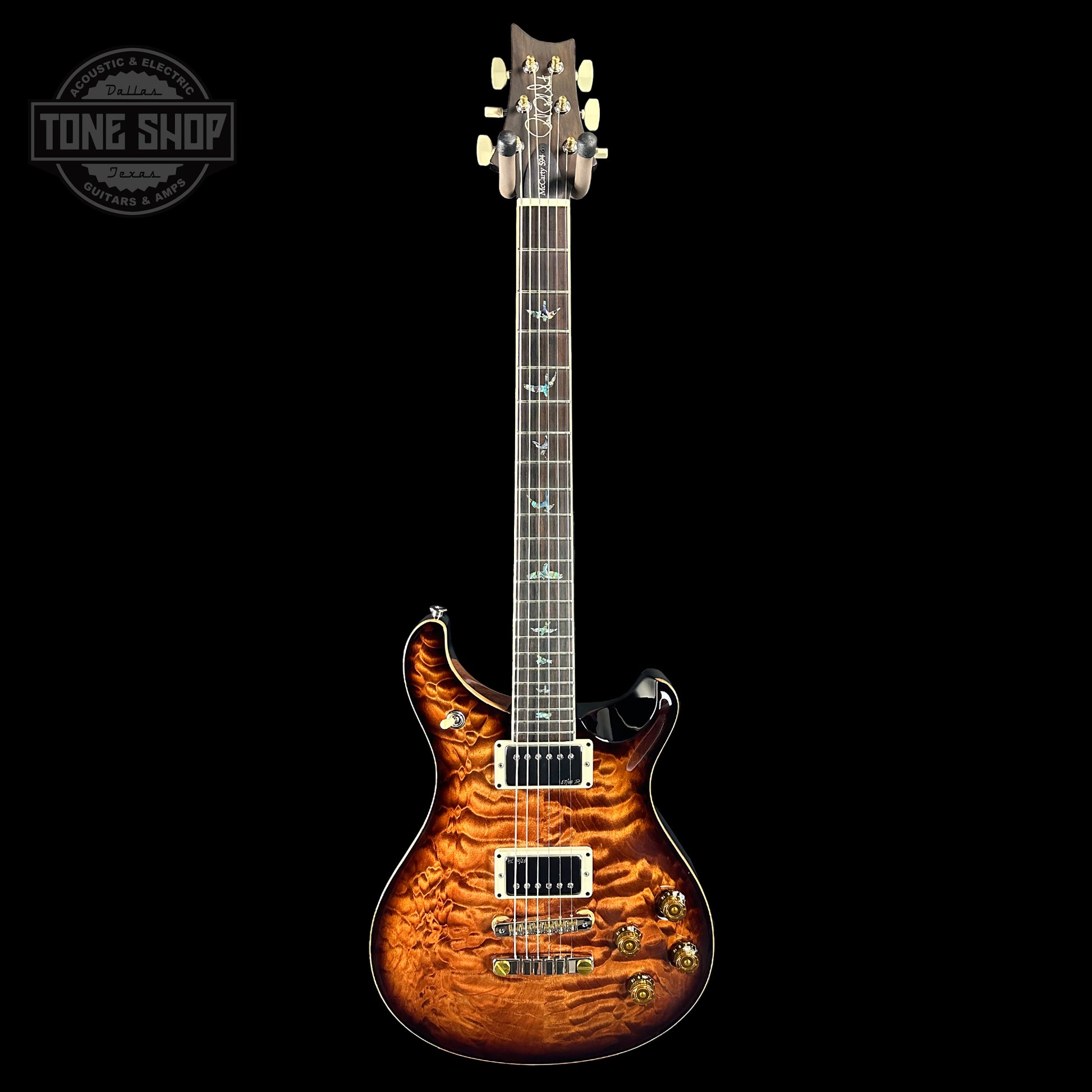 Full front of PRS Wood Library McCarty 594 10-top Quilt Copperhead Burst.