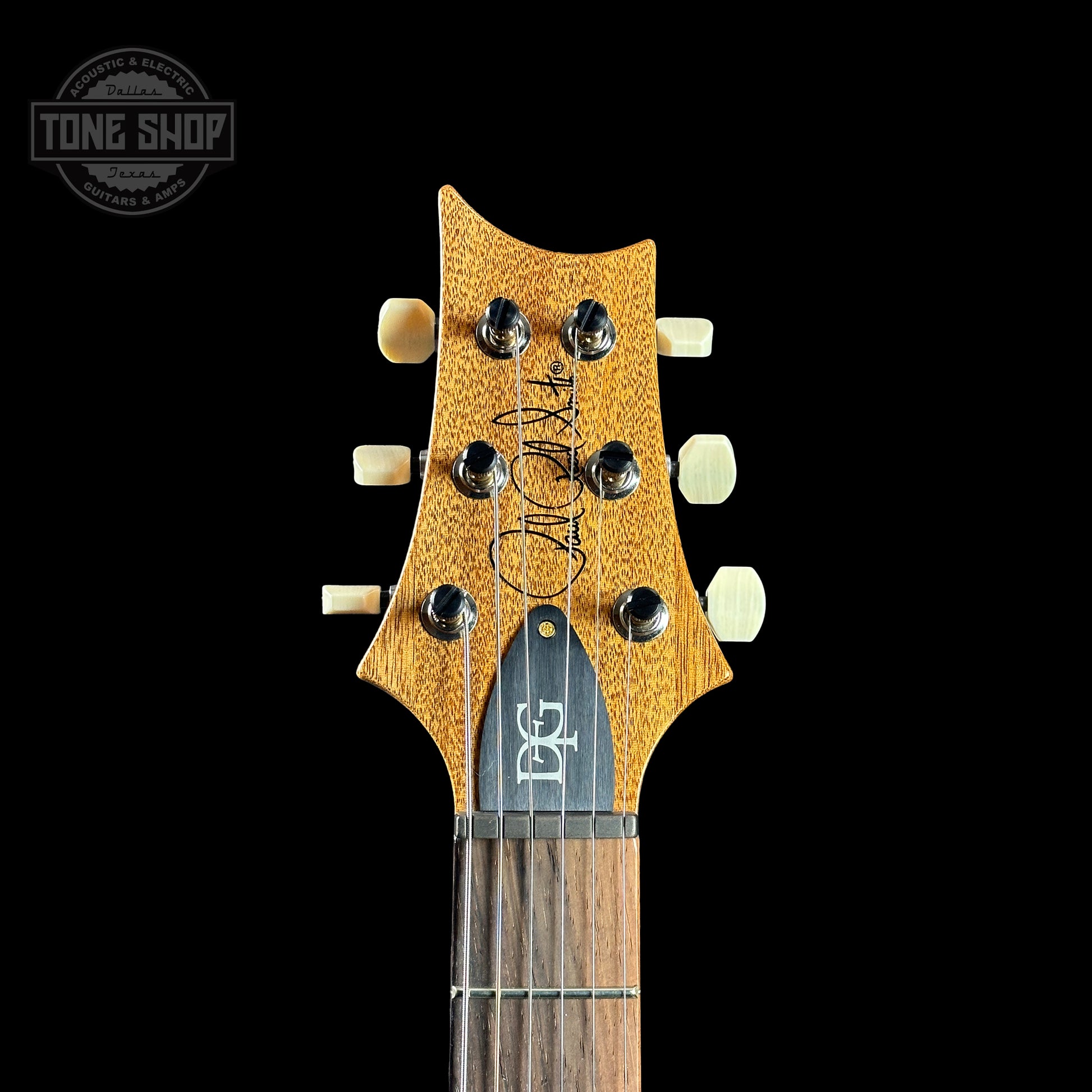 Front of headstock of PRS TSG Anniversary Wood Library Artist DGT Frostbite Brazilian Rosewood.