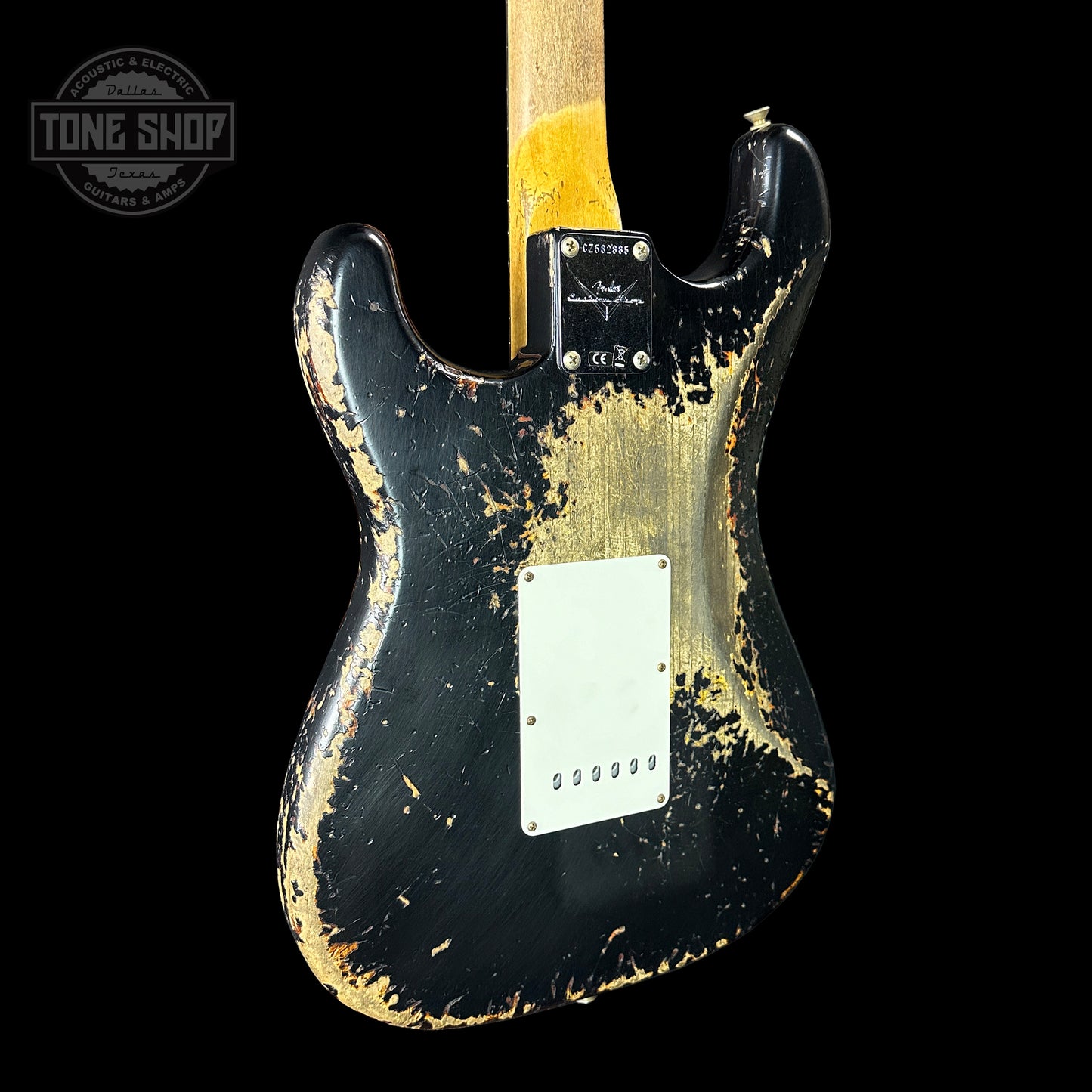 Back angle of Fender Custom Shop Time Machine '63 Strat Super Heavy Relic Super Faded Aged Black Over 3 Color Sunburst.