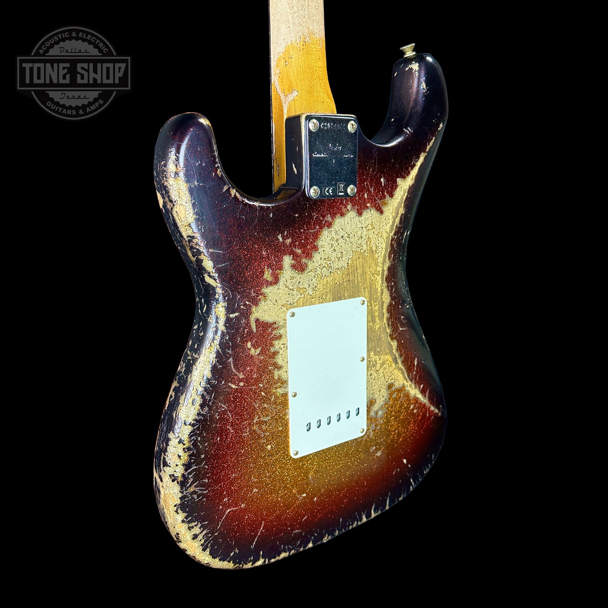 Back angle of Fender Custom Shop Time Machine '63 Strat Super Heavy Relic Super Faded Aged 3 Color Sunburst Sparkle.