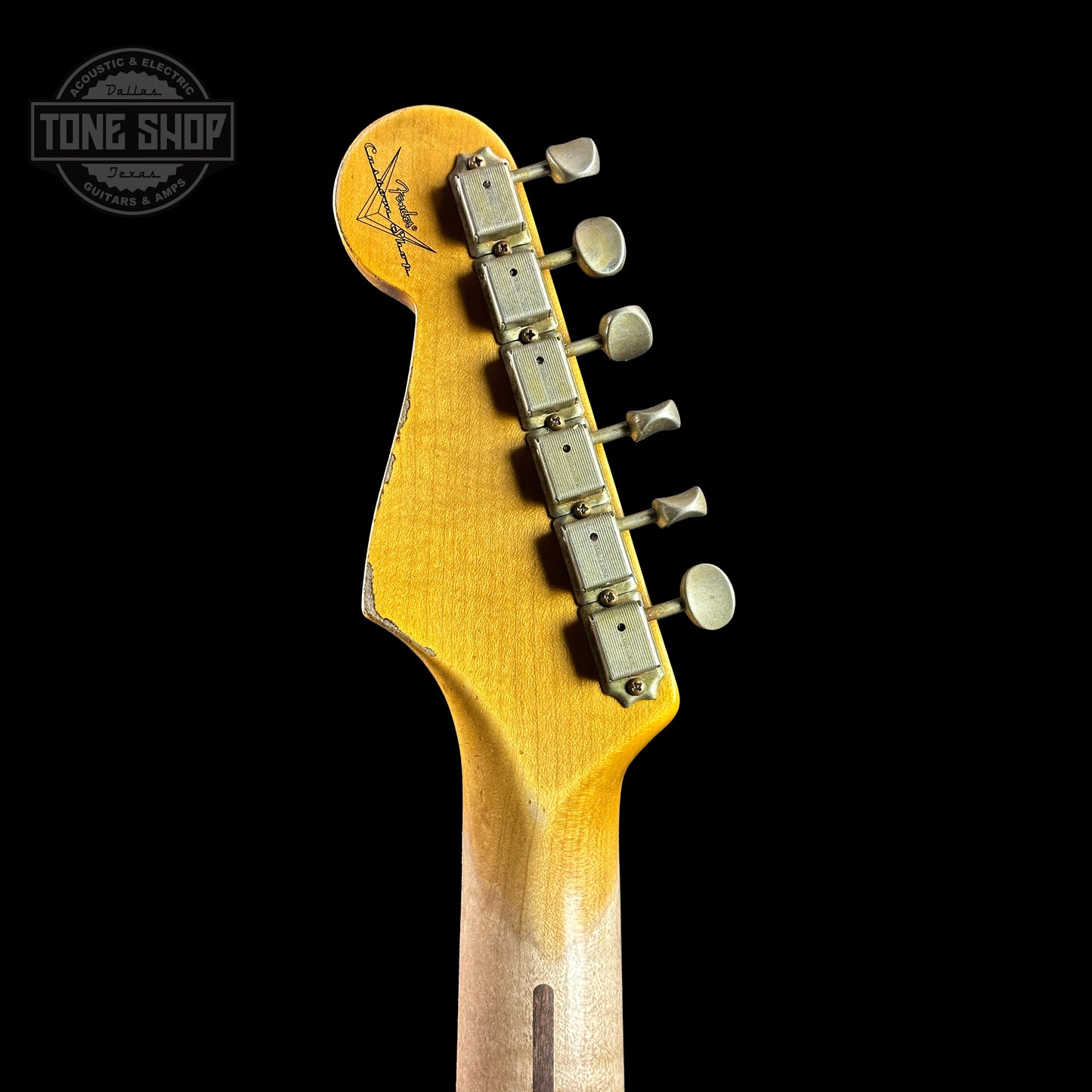 Back of headstock of Fender Custom Shop Time Machine '57 Strat Heavy Relic Faded Aged 2 Color Sunburst.