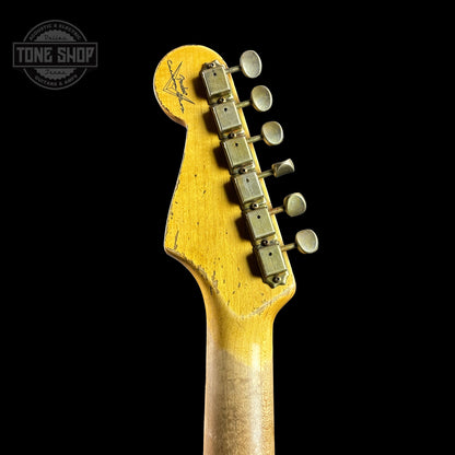 Back of headstock of Fender Custom Shop Time Machine '63 Strat Super Heavy Relic Super Faded Aged Black Over 3 Color Sunburst.