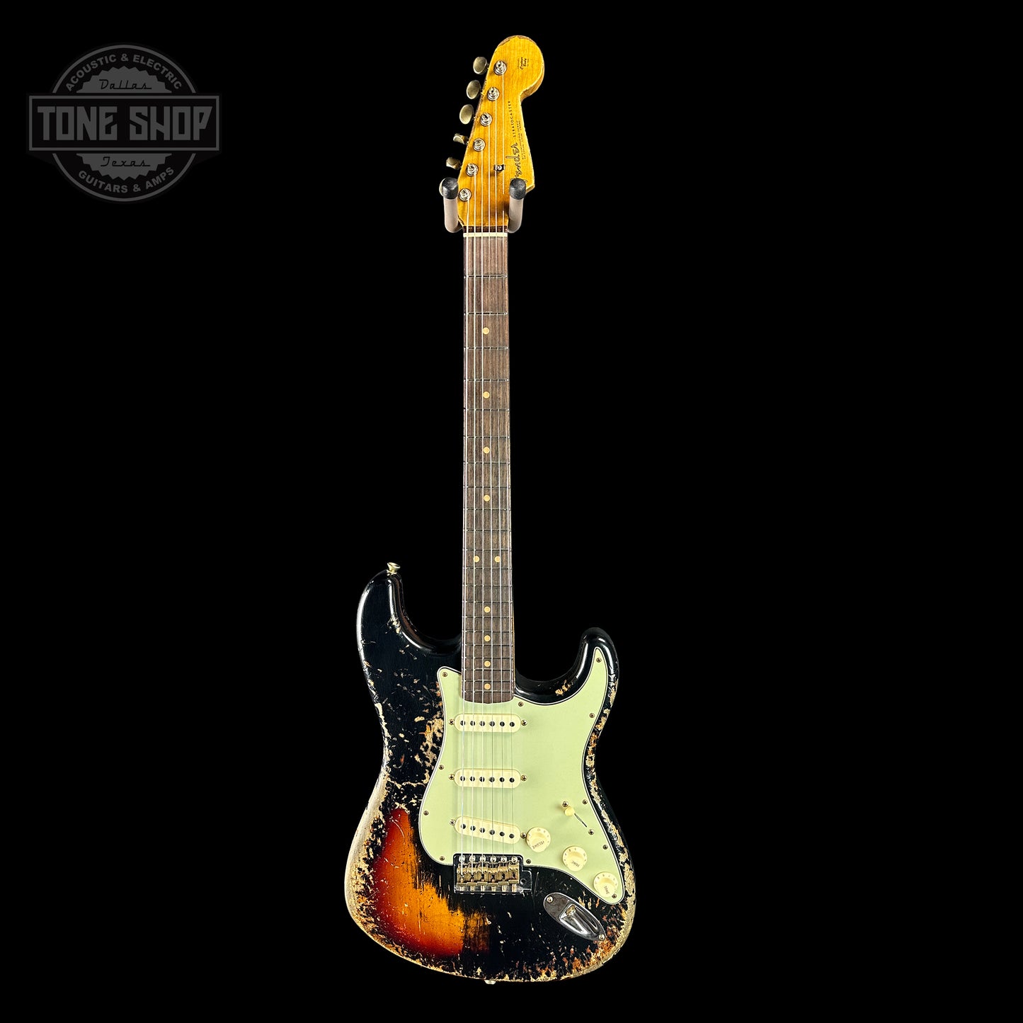 Full front of Fender Custom Shop Time Machine '63 Strat Super Heavy Relic Super Faded Aged Black Over 3 Color Sunburst.