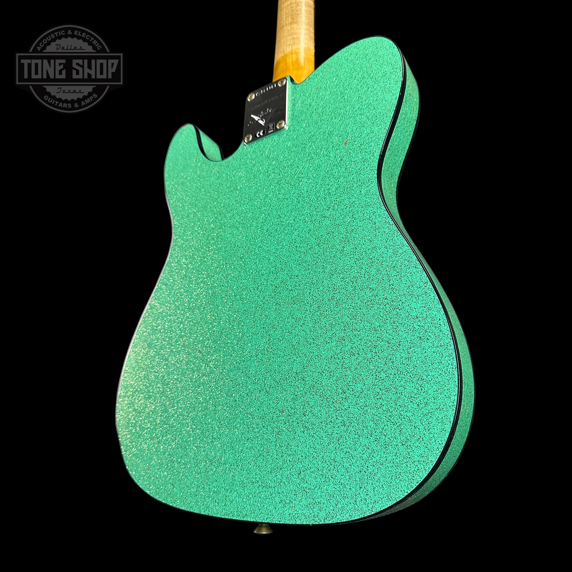 Back angle of Fender Custom Shop Limited Edition Cunife Tele Custom Journeyman Relic Aged Sea Foam Green Sparkle.