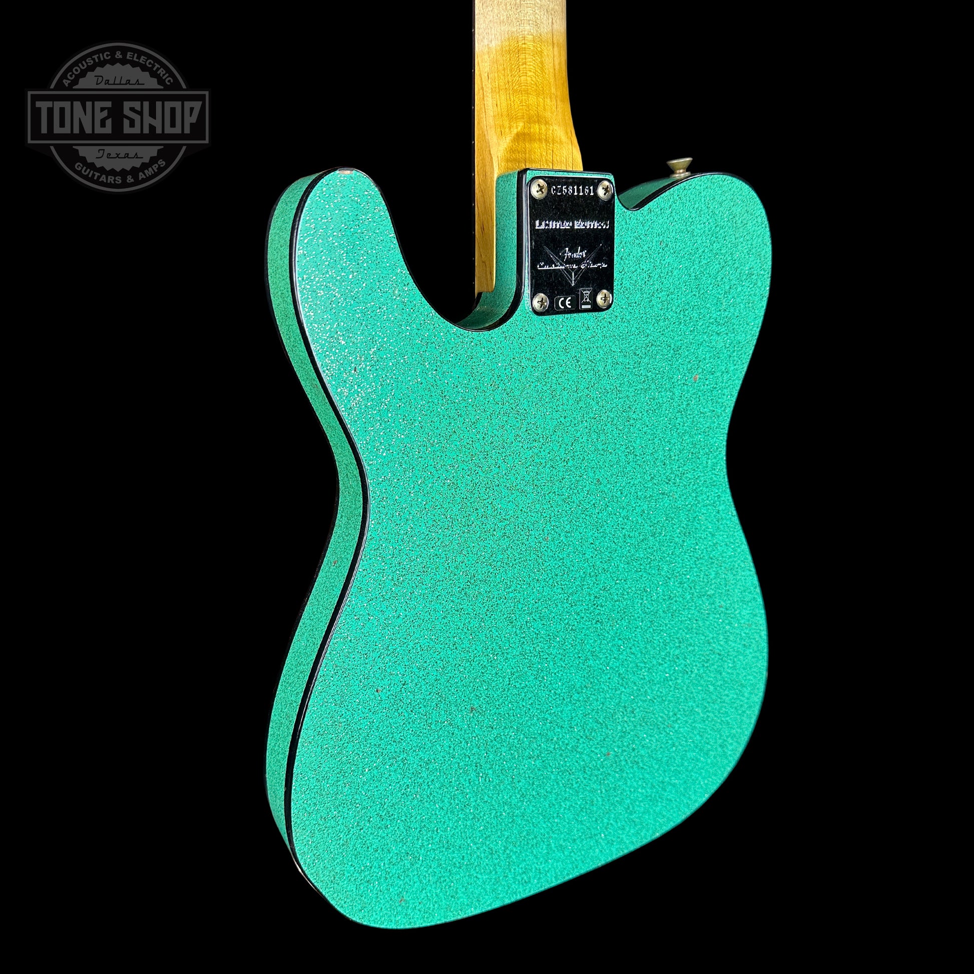 Back angle of Fender Custom Shop Limited Edition Cunife Tele Custom Journeyman Relic Aged Sea Foam Green Sparkle.