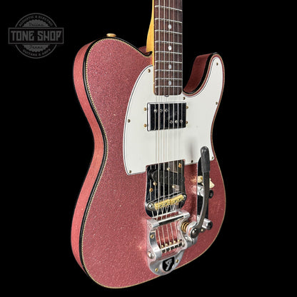 Front angle of Fender Custom Shop Limited Edition Cunife Tele Custom Journeyman Relic Aged Champagne Sparkle.