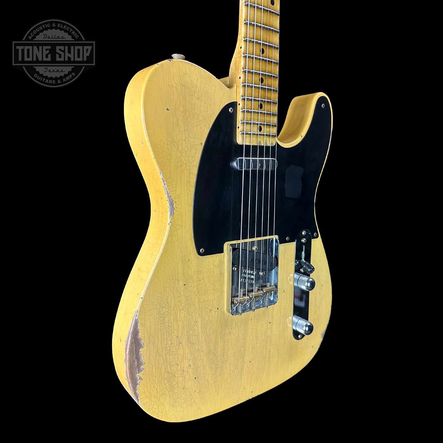 Front angle of Fender Custom Shop Time Machine '54 Tele Relic Faded Aged Nocaster Blonde.