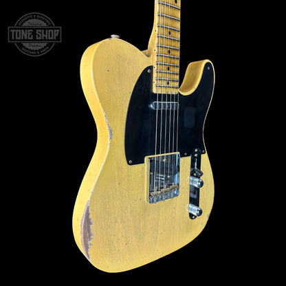 Front angle of Fender Custom Shop Time Machine '54 Tele Relic Faded Aged Nocaster Blonde.