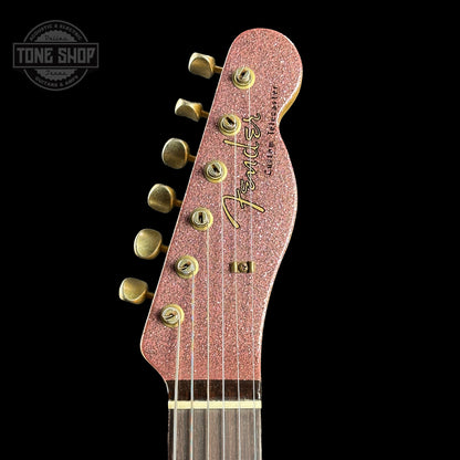 Front of headstock of Fender Custom Shop Limited Edition Cunife Tele Custom Journeyman Relic Aged Champagne Sparkle.