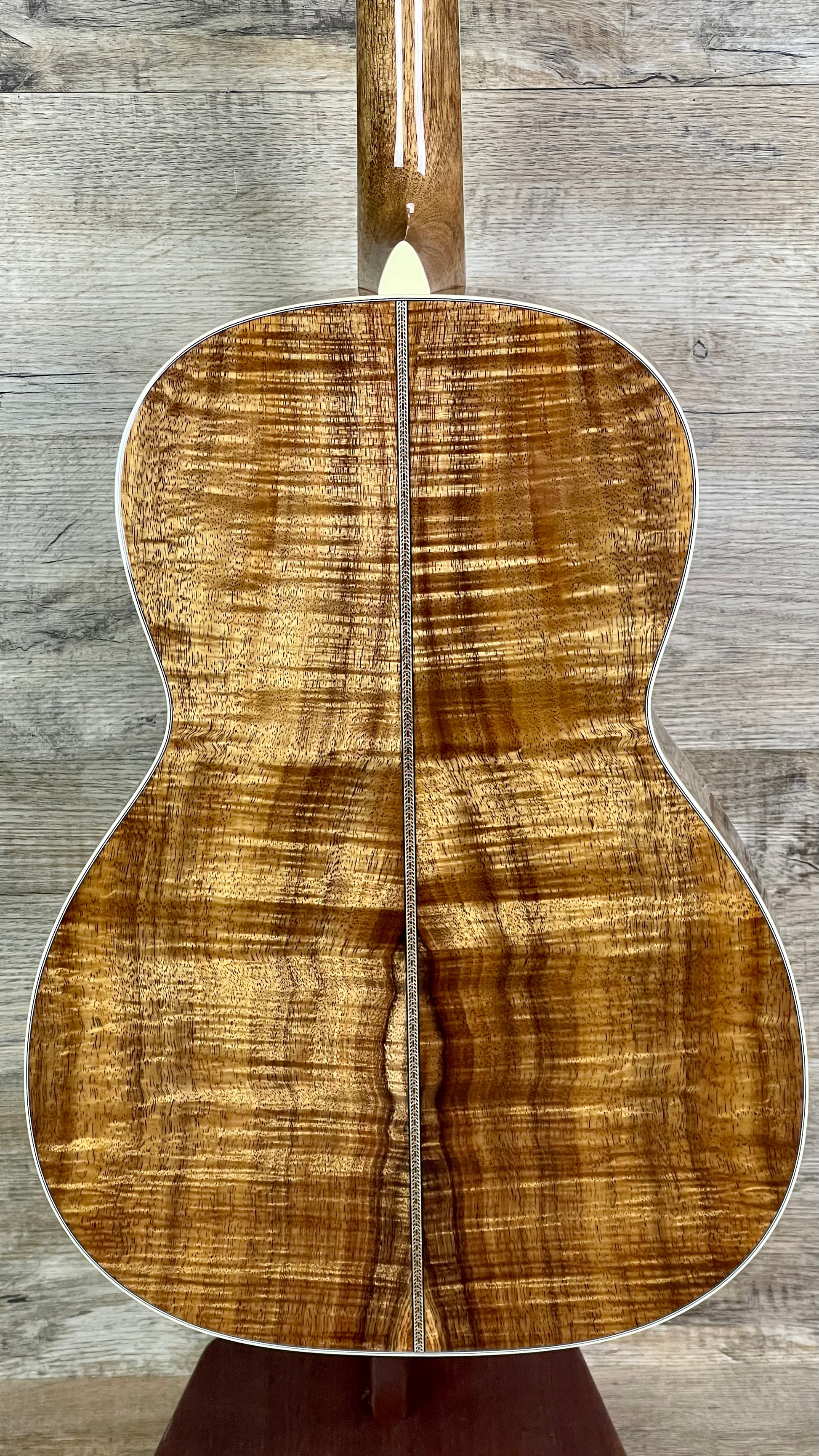 Back of Martin Custom Shop 42 Style 000 12-Fret All Highly Flamed Koa.